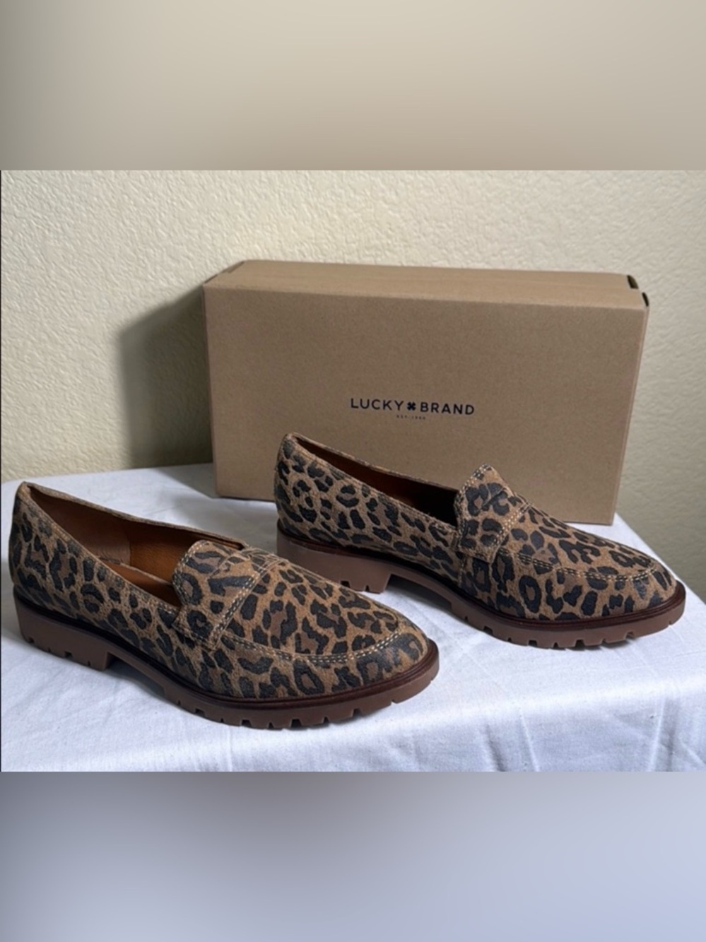 Lucky Brand Tomber Penny Loafers in a natural leopard print.